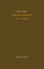 Sobre mi almohada una cabeza