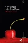 Cereza roja sobre losas blancas